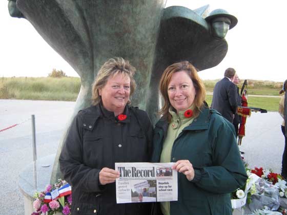 Paying tribute: Corinne Perriman and Susan Norris took their Record to Juno Beach, Normandy, France on Remembrance Day.