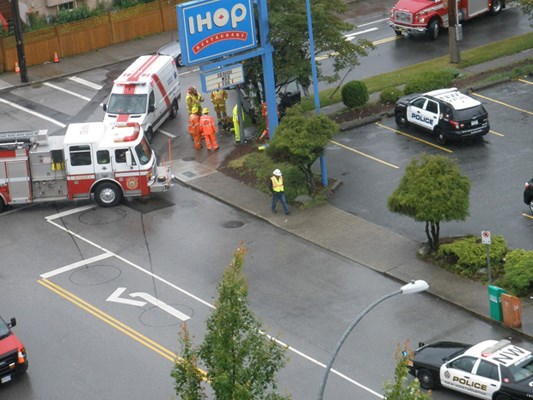 Injured: A New Westminster electrical worker suffered minor injuries after being struck by a passing car at Eighth Avenue and Sixth Street.