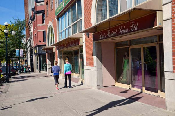 Window shopping: Shoppers stroll down bridal row.