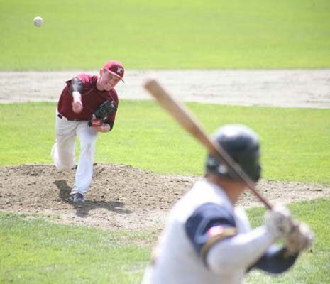 Gotcha: The Vancouver Cannons, in maroon, dropped a Premier Baseball League doubleheader to the Langley Blaze at Queen's Park Stadium last Saturday.