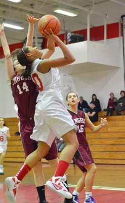 Right Knights: The St. Thomas More Knights defeated Little Flower Academy 54-29 in the Lower Mainland independent high school junior girls' basketball championships.