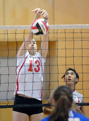 At the net: St. Thomas More's Kiana Bonamin gets some quality court time against Smithers en route to the Knights' sixth-place finish at the B.C.s.