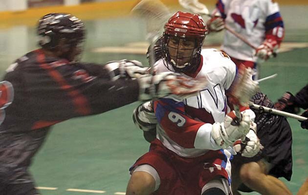 A blur of finesse: New Westminster Salmonbellie righthander Keegan Bal, in white, had two goals and three assists in a Game 3 loss to Delta on Tuesday. Bal garnered another five points in Wednesday's 11-7 win over the Islanders, giving him a total of 14 points in four playoff games to date.