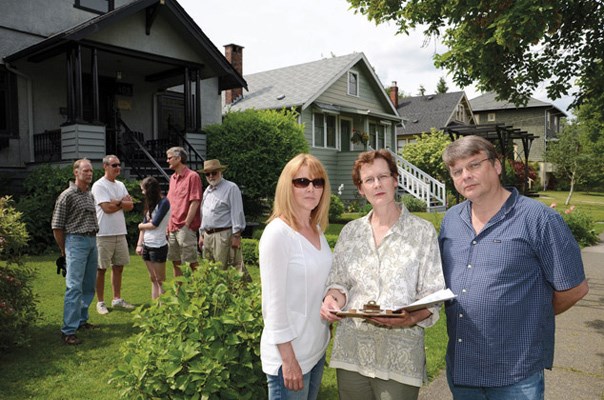 Not impressed: Many neighbours living around the Elizabeth Fry Society's head office aren't pleased about the society's plan to construct a new building on Sherbrooke Street. They collected a petition against the plan in June. Deb Niewerth, Catherine Cartwright and Jerry Sommers hold the petition.