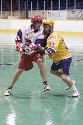 Tally man: Mark Negrin, in white, currently leads the junior New Westminster Salmonbellies in playoff scoring with 11 goals and 20 total points.