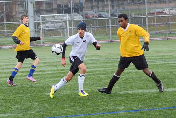 Pool winners: Jayson Santiago, centre against North Peace, helped Burnaby South to a fourth-place finish at the B.C. high school AAA soccer championships Saturday.