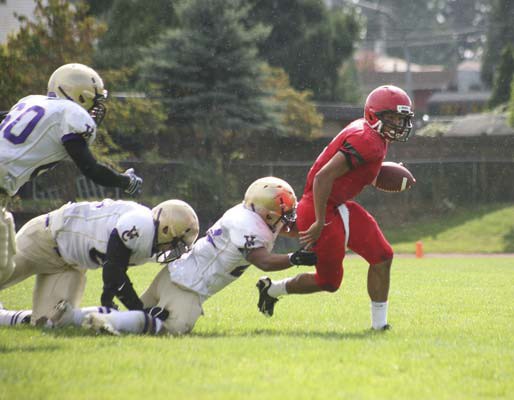 Home turf: The fifth-ranked St. Thomas More Knights upset the provincially top-seeded Vancouver College Fighting Irish 14-7 in an B.C. AAA varsity high school exhibition football game at last Saturday's Homecoming Game in Burnaby.