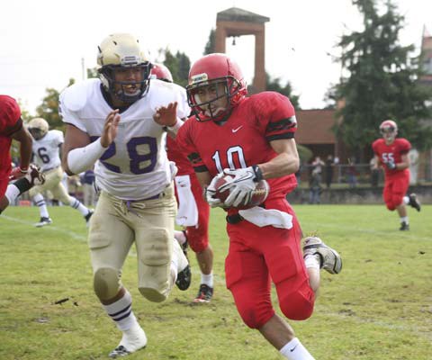 Home turf: The fifth-ranked St. Thomas More Knights upset the provincially top-seeded Vancouver College Fighting Irish 14-7 in an B.C. AAA varsity high school exhibition football game at last Saturday's Homecoming Game in Burnaby.