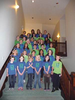 All together now: The Vivo Children's Choir gathers for a group photo on the stairs at Olivet Baptist Church, where they rehearse on Wednesday nights.
