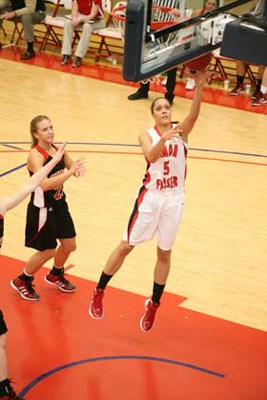 In the paint: Simon Fraser University knocked off Western Oregon in a Great Northwest conference women's basketball game at the West Gym on Saturday.