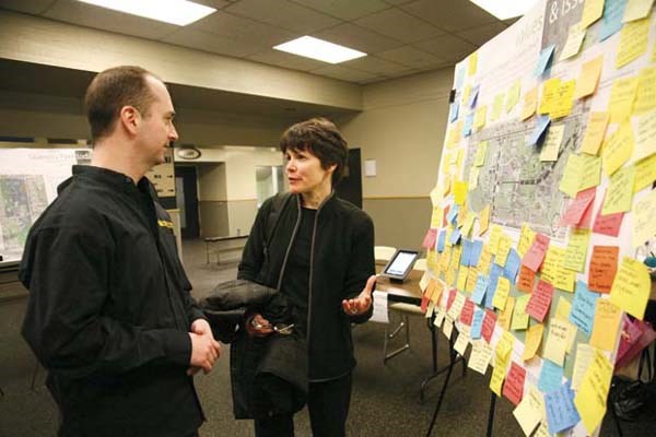 New Westminster resident Elizabeth Clarke chats with city employee Jay Young, who is coordinating the city's update of the Queen's Park master plan. The City of New Westminster held an ideas event at Queen's Park on March 10 to get public input into the plan.