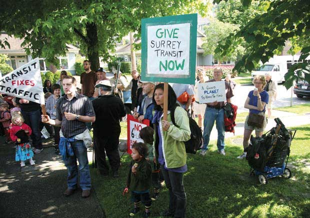 In protest: Residents from Surrey and New Westminster gathered during a recent TransLink open house to protest a potential six-lane Pattullo Bridge expansion and to push for more transit for Surrey. In all, about 90 people took part in the protest, according to organizers.