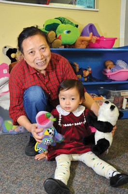Play time: Two year old Hanzi hangs out with Grandma Jean in the playroom at New Westminster Family Place. The group provides drop-ins and a resource program for local families with children up to the age of five.