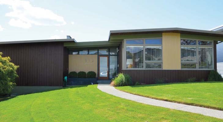Retro chic: Sheila Sullivan and Oliver Demuth's mid-century modern home in Massey Heights. The couple bought the property in 2008. The home was custom built for Helen and William Dempsey in 1956 and was the Demspey family home for 50 years.