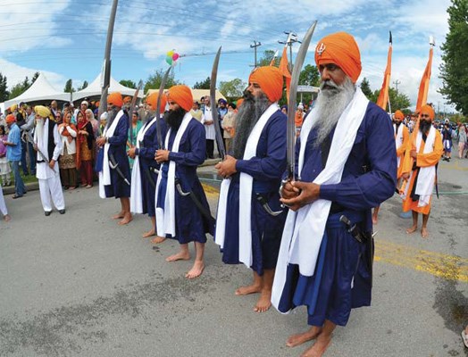 A religious procession: A religious procession started at the Sikh temple in Queensborough and concluded near Ryall Park, where residents of all faiths were invited to taste a variety of delicacies and get information in various booths and tents.