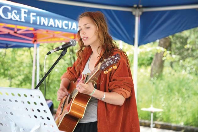 Let me entertain you: Jasmine Harvey performed at the New Westminster Firefighters' Charitable Society's June 2 shred-athon. The event raised money for the society, which then donates money to various community programs in New Westminster.
