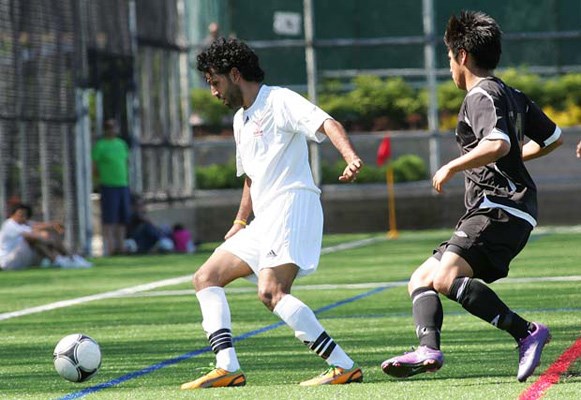 Good start: Khalsa Sporting Club, in white, opened the Pacific Coast Soccer League men's premier division with a pair of wins over two Victoria teams at Queen's Park last weekend.