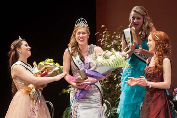 In the spotlight: Amanda Zacharuk reacts to being named Miss New Westminster Ambassador on Saturday night, while fellow contestants cheer her on.
