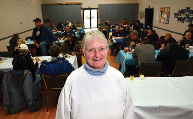 Helping out: Roxee Forrest, associate warden at St. Barnabas Church, helps out at a recent community lunch. More and more people are attending the church's weekly community lunch and emergency food cupboard programs, two of the churchs' outreach programs.