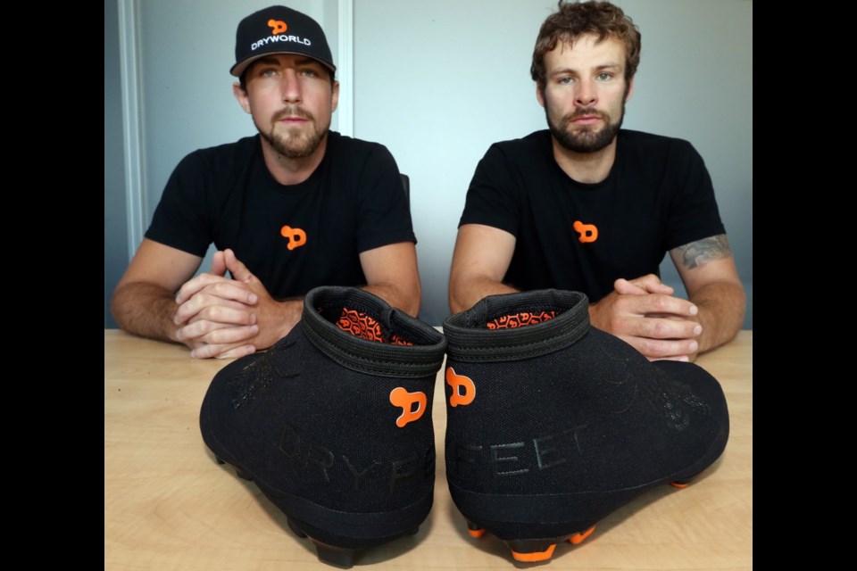 Matt Weingart and Brian McKenzie are testing their Dryfeet cleat sleeves at the Pacific Institute for Sports Excellence.