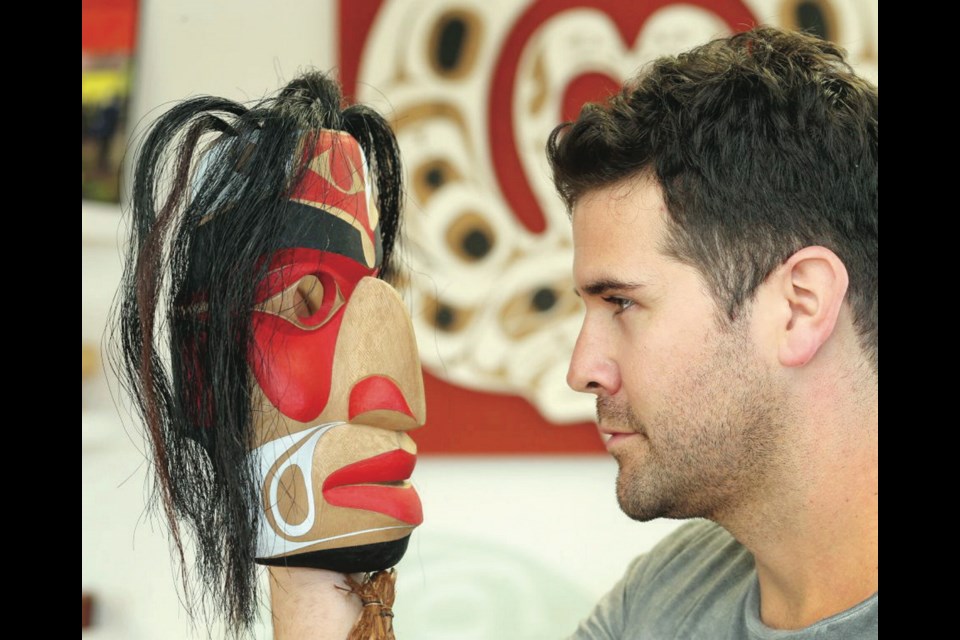 First Nations artist Rande Cook enjoys carving with western red cedar.