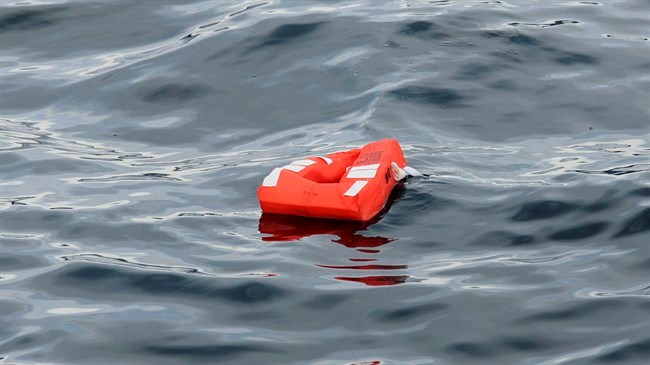 A lifejacket from the Queen of the North ferry floats in the waters of Wright Sound near Hartley Bay, B.C., on March 22, 2006.