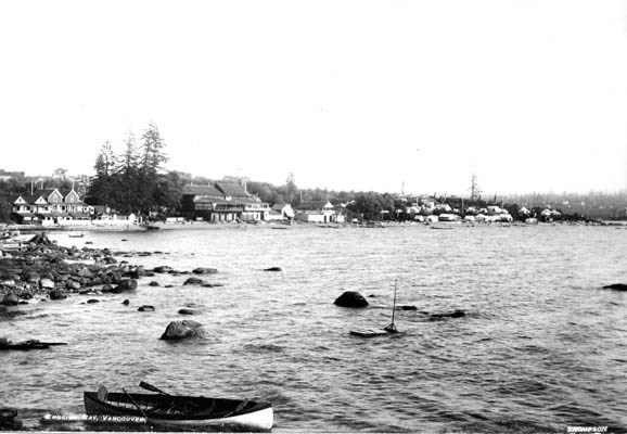 Cottages on English Bay: This photo shows cottages, the men's-only English Bay Club, Simpson's Boathouse and some tents along English Bay circa 1898.