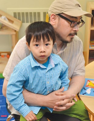 Busy dad William Wong and son Samuel see Richmond Family Place's Dad and Child Breakfast as a chance to spend quality family time.