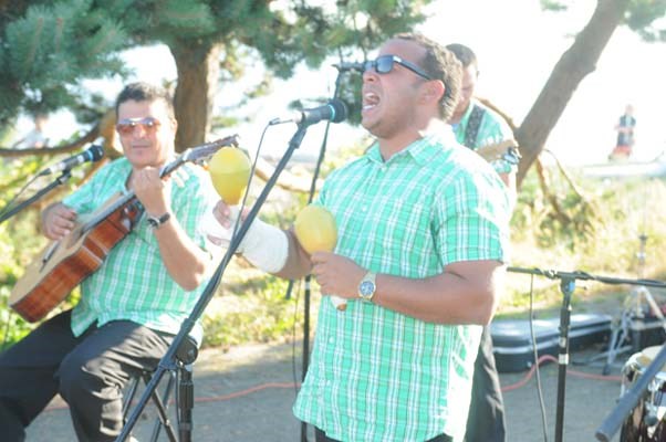 The Cuban band "Brisas del Palmar livens up the "Salsa by the Sea" latin dance party at the Ferry Building Landing in West Vancouver. Every Thursday evening until August 29, from 6:30-8:30 for a $6 drop in fee, learn Salsa dance steps and enjoy a variety of Latin music.