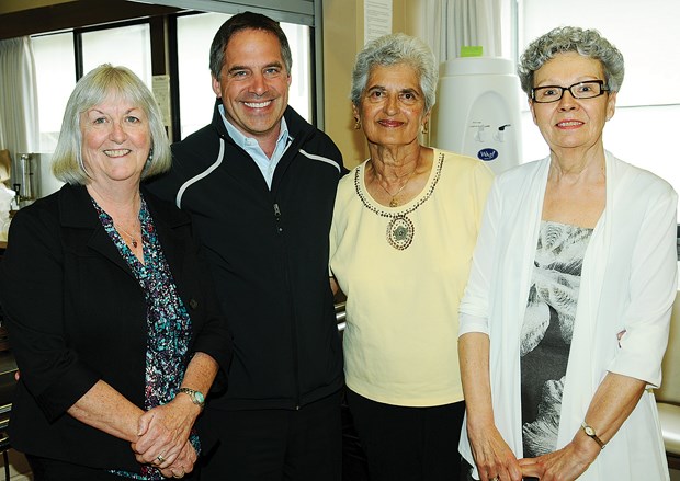 Society president Margaret Coates, City of North Vancouver Mayor Darrell Mussatto, Del Dimock and society vice-president Carolyn Dykeman