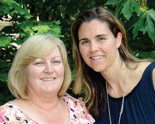 Teacher Barbara Corbin and executive vice-president Julie Cameron