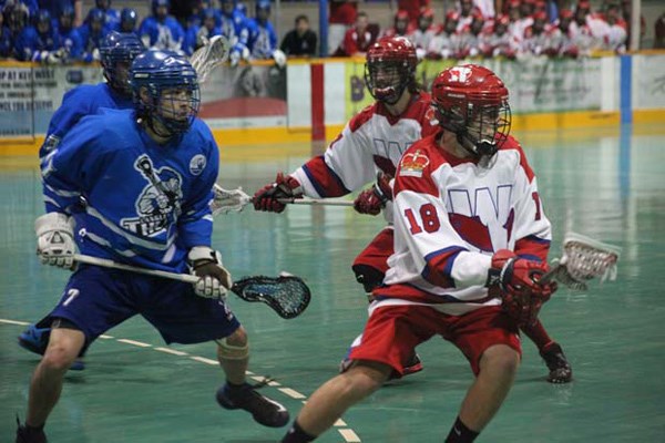 Taking it to them: The junior A New Westminster Salmonbellies took the series lead with a 12-6 win over the Langley Thunder in the opening game of the B.C. Junior Lacrosse League best-of-five semifinal playoff at Queen's Park Arena on Tuesday.