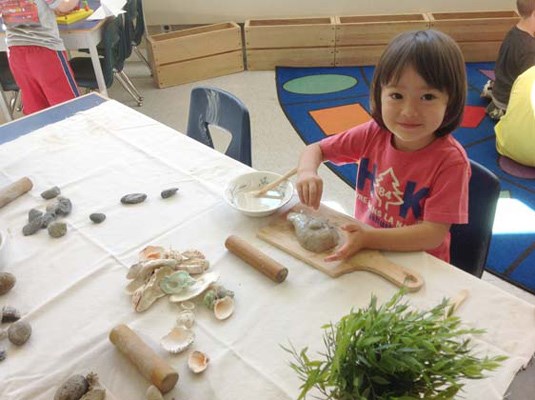 For the kids: Ailah Dalley enjoys an activity at Queens Avenue Daycare, one of the non-profit child-care centres that received a city grant.