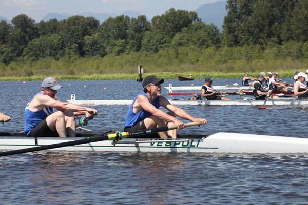 Pulling for the line: Competitors take to the oars in a 1,000-metre men's sweep race during the Cascadia masters rowing regatta on Burnaby Lake on Saturday.