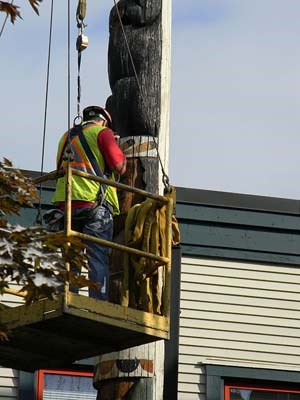 The totem pole that has stood in front of the Delta Museum building on Delta Street in Ladner Village since 1931 was removed yesterday morning.
