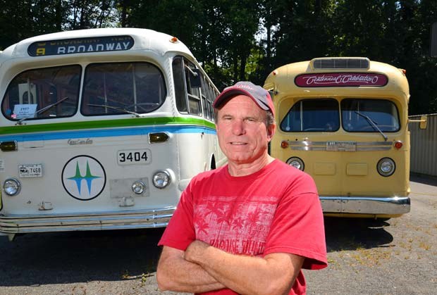 In need of a good home: Bryan Larrabee, secretary of the Transit Museum Society, with some of the group's heritage buses. The society is scrambling to find a way to save its heritage vehicle collection after learning that it will have to leave its current warehouse location by Sept. 30. TransLink budget cuts mean the regional transit authority will no longer be supporting the society financially.