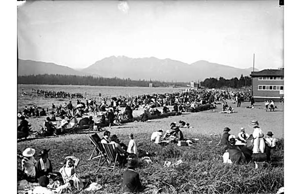 Kitsilano Beach then: Sunbathers enjoy a warm day at Kitsilano Beach in 1921.