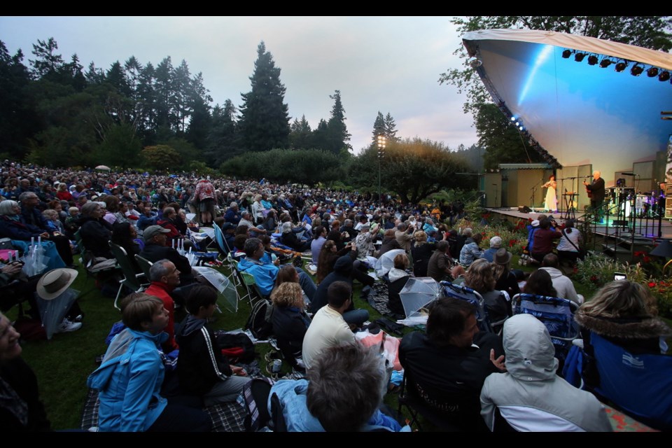 Canadian folk-icon Bruce Cockburn performs during a special concert at Butchart Gardens on Wednesday evening.
