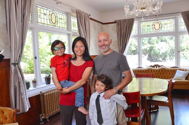Sweet home: Deanna Tan Francoeur and her husband, David Francoeur, with their kids, in their 100-year-old house in Glenbrooke. The couple, who weren't even in the market for a new house, snatched up the heritage gem in 2011.