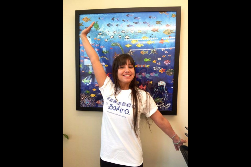 Imperfect and loving it: Amy Pezzente wears the official Perfect is Boring T-shirt. The Burnaby resident is the coordinator for the Provincial Eating Disorders Awareness campaign, which is running a Perfect is Boring photo contest.