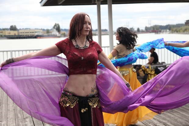 Entertain us: Shimmy for the Soul performs a belly dance routine at the seventh annual Quayside Boardwalk Festival and Sale. The event featured a variety of entertainment, a kids' zone, food carts and, of course, hundreds of vendors selling everything from antique furniture to vintage clothing.