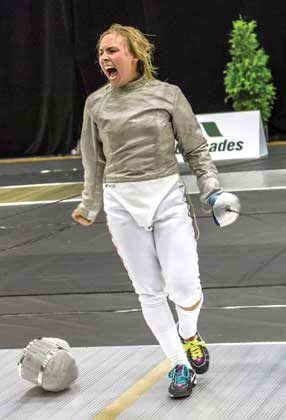 North Vancouver’s Zoe Clarke celebrates an important victory. The 16-year-old Handsworth student took up the sport of fencing at age 12 after reading about it in a novel.