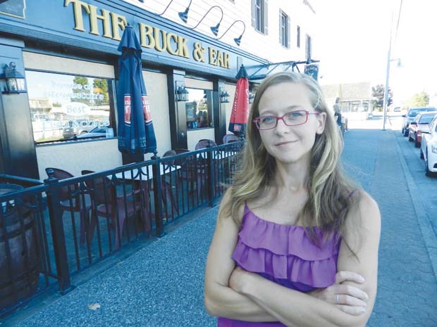 Gennesse Langdon, manager of the Buck & Ear Bar & Grill in Steveston is opposed to selling alcohol at corner stores.