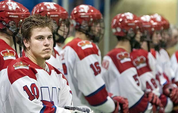 The agony of defeat: New Westminster's Tyrell Hamer-Jackson shows the disappointment in his face after losing the Minto Cup in a four-game series to the Whitby Warriors on Sunday.