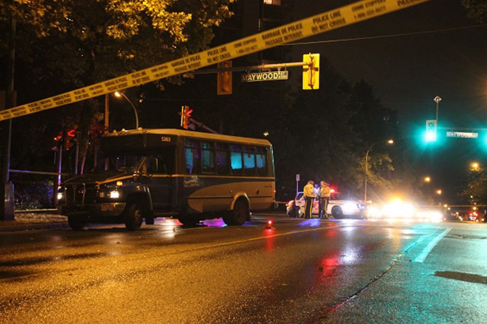 Investigating: Burnaby RCMP cordoned off an area of Willingdon Avenue at Maywood Street last night as they investigated an accident involving a Coast Mountain bus shuttle and pedestrian. The female pedestrian remains in hospital in critical condition.
