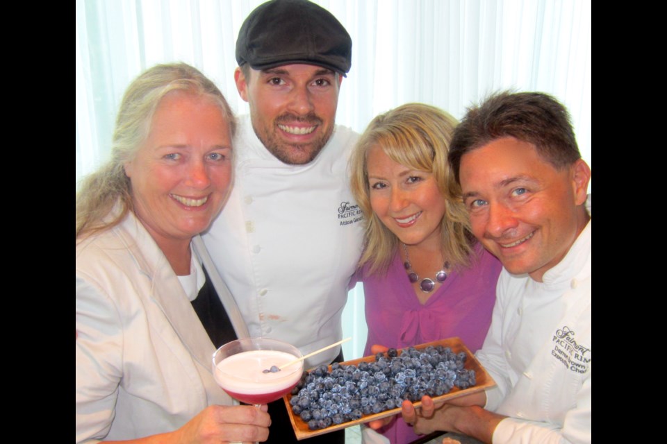 Extolling the virtues of B.C. blueberries were, from left, Debbie Etsell, Atticus Garant, Patricia Chuey and Darren Brown.
