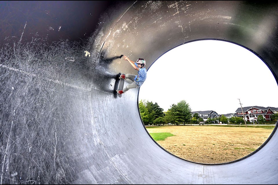 Skateboarders were stoked to show their stuff at the Summer Jam BBQ in Queensborough. In this photo, 15-year-old Noah Eastwood attempts a full-pipe at the all-wheel park.