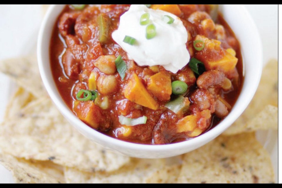 A mix of beans, yams, tomatoes and other vegetables make this chili a hearty meal.