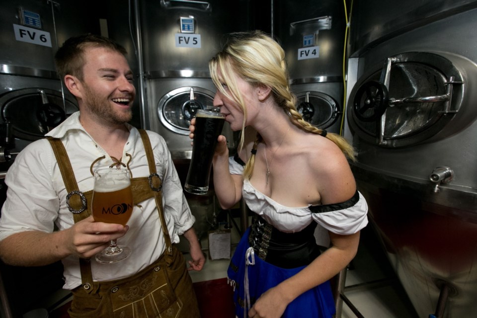Clay Potter and Chelsea Walker at their Moon Under Water Brew Pub on Bay Street in Victoria. Brewmaster Potter will debut four of his creations at the Great Canadian Beer Festival, which takes place at Royal Athletic Park Friday and Saturday.