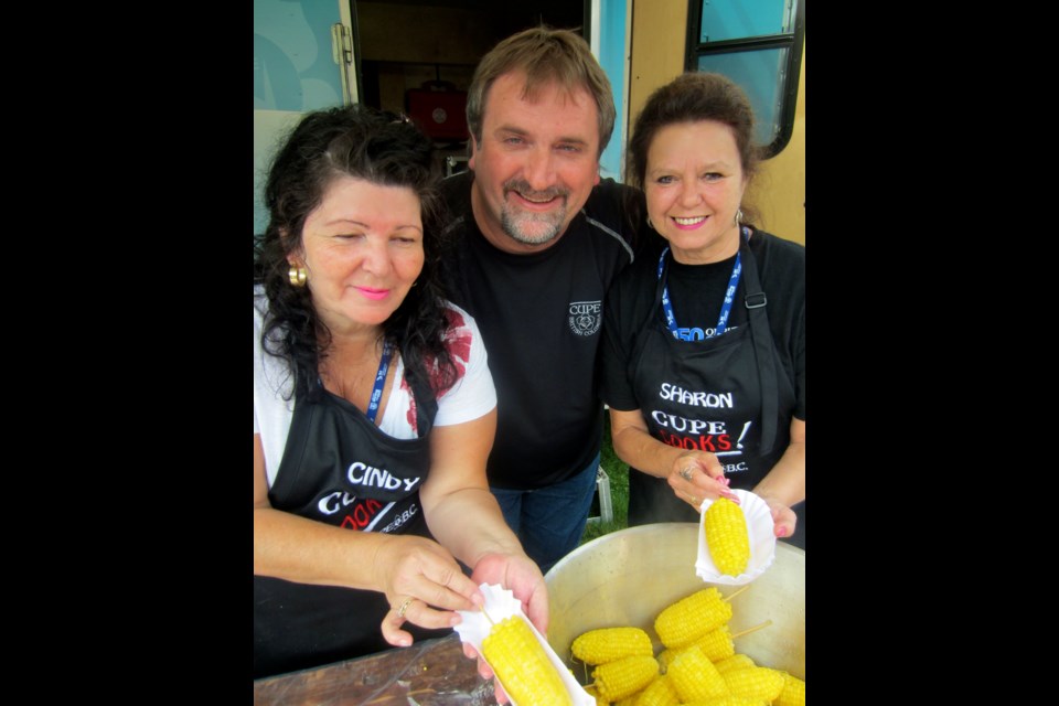 CUPE B.C. president Mark Hancock, Cindy McQueen and Sharon Prescott served up hundreds of fresh Chilliwack corn at the annual Labour Day picnic.